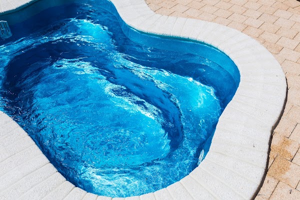 J&c Fiberglass Pools Inc outdoor pool installation